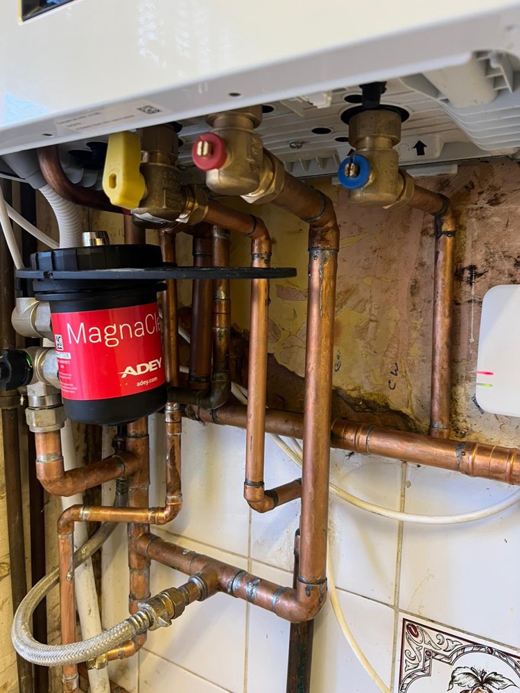 Copper pipework and a magnetic system filter fitted on a heating system